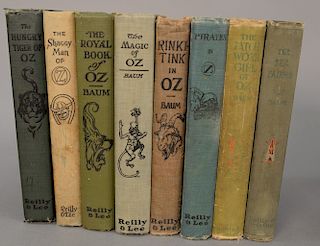 Collection of eight Frank Baum first edition Oz Books including "The Hungry Tiger of OZ", "The Shaggy Man of OZ", "The Royal Book of...