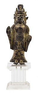 A Gilt Bronze Figure of Guanyin Height 6 inches (without stand).