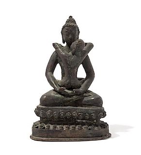 A Bronze Figure of Buddha Height 7 1/2 inches.