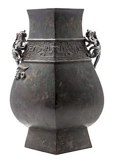 * A Bronze Hexagonal Vase Height 15 1/2 x width 11 inches.