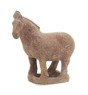 * A Pottery Figure of a Horse Width 5 5/8 inches.