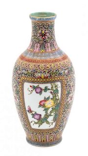 A Famille Rose Porcelain Vase Height 7 1/4 inches.