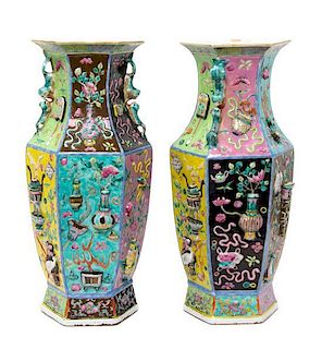 A Pair of Porcelain Vases LATE QING DYNASTY, CIRCA 1850 Height 16 inches.