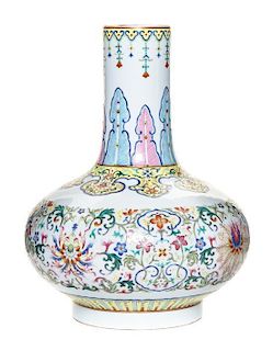 A Famille Rose Porcelain Footed Vase Height 11 1/4 inches.