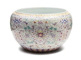 A Famille Rose Porcelain Jardiniere Height 5 3/4 x diameter 9 inches.
