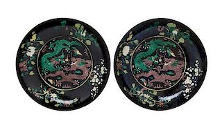 A Pair of Famille Noire Porcelain Plates Diameter of pair 10 1/4 inches.