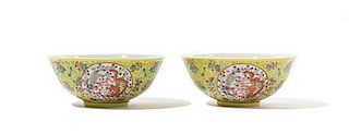 A Pair of Famille Jaune Porcelain Bowls Diameter 6 1/2 inches.