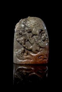 A Carved Hardstone Toggle Height 3 1/2 inches.