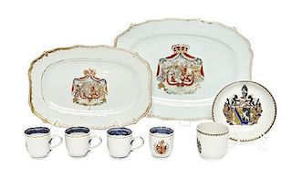A Group of Chinese Export Porcelain Armorial Table Articles, Length of larger platter 13 inches.