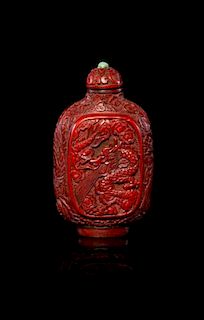 A Cinnabar Lacquer Snuff Bottle Height 3 1/2 inches.