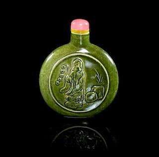 A Green Glaze Porcelain Snuff Bottle Height 2 3/8 inches.