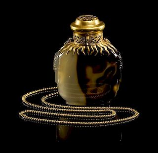 * A Gold Mounted Shadow Agate Snuff Bottle Height 3 inches.