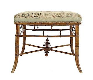 A Victorian Faux Bamboo Footstool, Height 18 x width 20 1/2 inches.