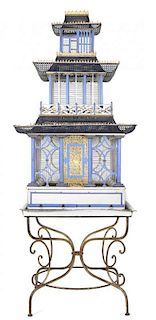 A Large Victorian Pagoda-Form Bird Cage, Height without base table approx. 65 x width 34 1/4 x depth 34 inches.