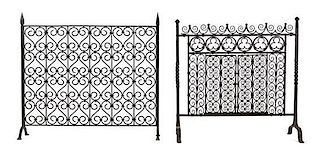 Two Spanish Baroque Style Wrought Iron Firescreens The larger height 35 1/2 x width 38 1/2 inches.