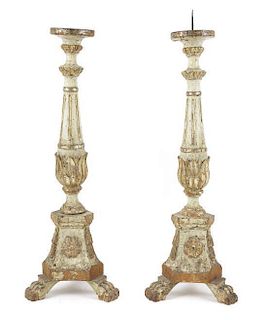 A Pair of Italian Baroque Style Painted and Parcel Gilt Pricket Sticks, Height 33 1/2 x diameter 11 1/2 inches.