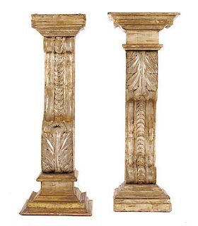 A Pair of Italian Carved, Painted, and Parcel Gilt Corbel Pedestals, Height 52 x width 18 1/2 x depth 12 1/2 inches.