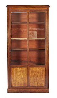 A Continental Walnut Bibliotheque Cabinet, Height 71 x width 35 x depth 12 inches.