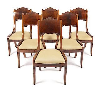 Six Biedermeier Flame Mahogany Side Chairs, Height 37 1/2 x width 19 3/4 x depth 21 1/2 inches.