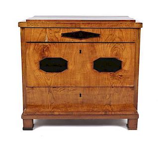 A Biedermeier Fruitwood and Partially Ebonized Commode, Heght 32 3/4 x width 35 x 19 7/8 inches.