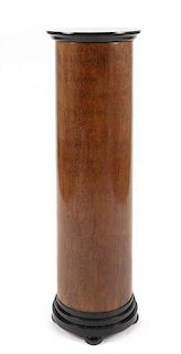 A Biedermeier Style Birds Eye Maple and Partially Ebonized Pedestal, Height 41 1/2 x diameter 12 3/4 inches.