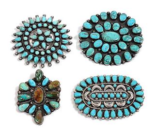 Four Southwestern Silver and Turquoise Brooches Diameter of largest 2 7/8 inches