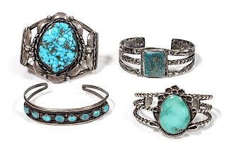 Four Southwestern Silver and Turquoise Bracelets Length of largest 5 1/4 x opening 3/4 x width 2 1/4 inches