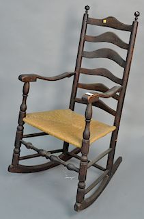 Six slat ladderback great chair with rush seat, now with rockers. total height 44 in.