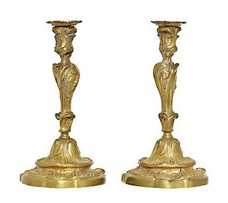 A Pair of Louis XV Style Gilt Bronze Candlesticks, Height 10 1/2 inches.