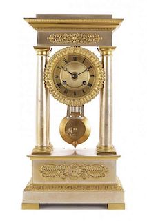 An Empire Style Gilt Bronze Mantel Clock, Height 16 1/2 inches.