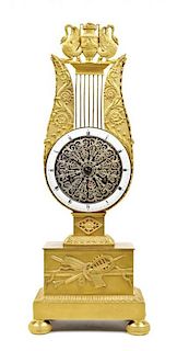 An Empire Style Gilt Bronze Mantel Clock, Height 17 inches.