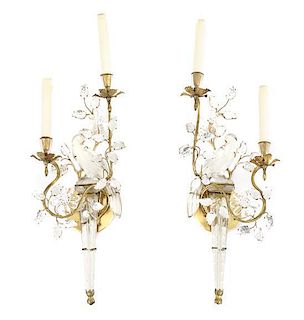 A Pair of French Bronze and Crystal Figural Two-Light Wall Sconces, Length 23 inches.