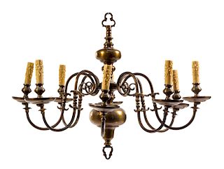 A Dutch Baroque Style Brass Eight-Light Chandelier Height 25 x diameter 32 inches.