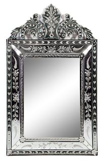 * A Venetian Glass Mirror Height 50 x width 31 1/2 inches.
