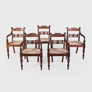 Set of Ten Anglo-Indian Carved Hardwood and Caned Dining Chairs