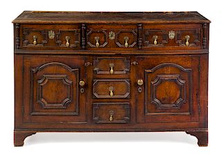 A Charles II Oak Cabinet 