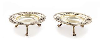 A Pair of Edwardian Silver-Gilt Footed Bonbon Dishes, London, 1908 Diameter 6 inches.