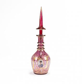 Decanter in engraved, enamelled and gilt rose crystal of Bo Decantador en cristal rosado grabado, esmaltado y dorado de