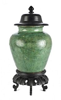 A Chinese Green Glazed Ceramic Vase, Height 14 inches.