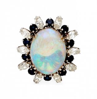 Ring with opal framed with diamonds and sapphires Sortija con ópalo orlado de diamantes y zafiros