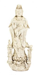 A Large Blanc de Chine Figure of Standing Guanyin, Height 48 inches.
