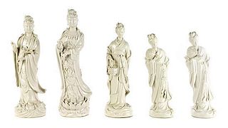 A Group of Five Blanc de Chine Figures, Height 12 inches.
