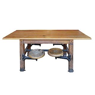 An Industrial Table with Swing Arm Seats 71" W x 29.5" D x 30" H