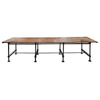 An Iron and Wood Industrial Table 134" W x 33" D x 30" H