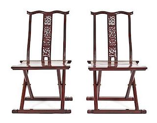 A Pair of Modern Chinese Hong Mu Folding Campaign Chairs, Height 43 inches.