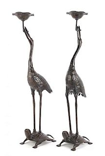 A Pair of Asian Export Figural Bronze Candle Holders, Height 28 x width 6 x depth 8 inches.