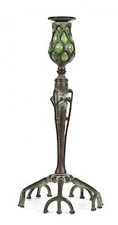 A Tiffany Studios Bronze and Favrile Glass Candlestick, Height 13 1/2 inches.