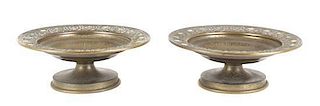 A Pair of Tiffany Furnaces Dore Bronze and Favrile Glass Compotes, Height 2 5/8 x diameter 7 1/8 inches.