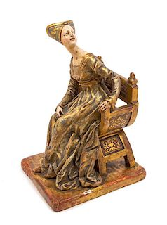 * An Italian Painted and Gilt Figure Height 13 inches.
