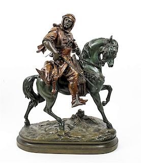 * A Cast Metal Figure of a Horse and Rider Height 25 inches.